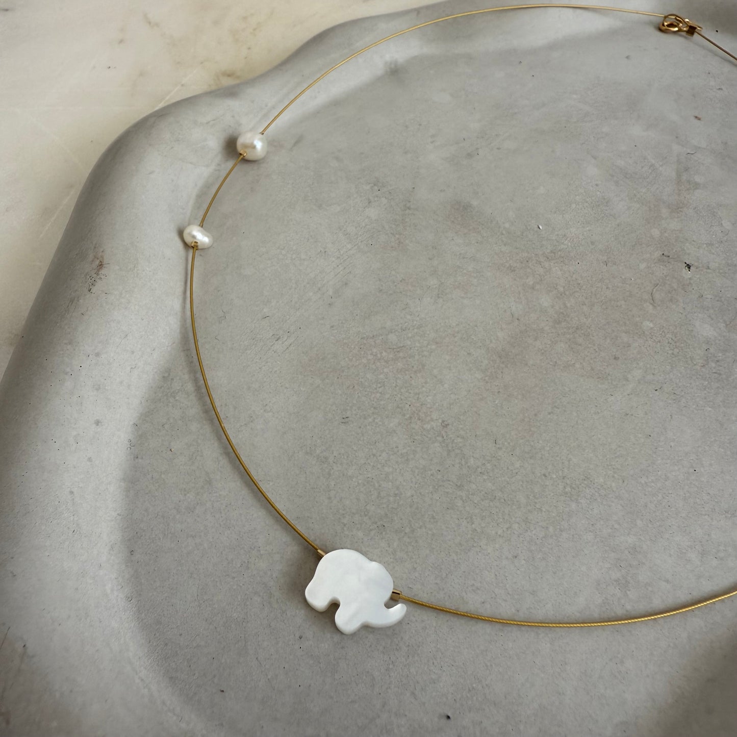 Elephant and Pearl Necklace