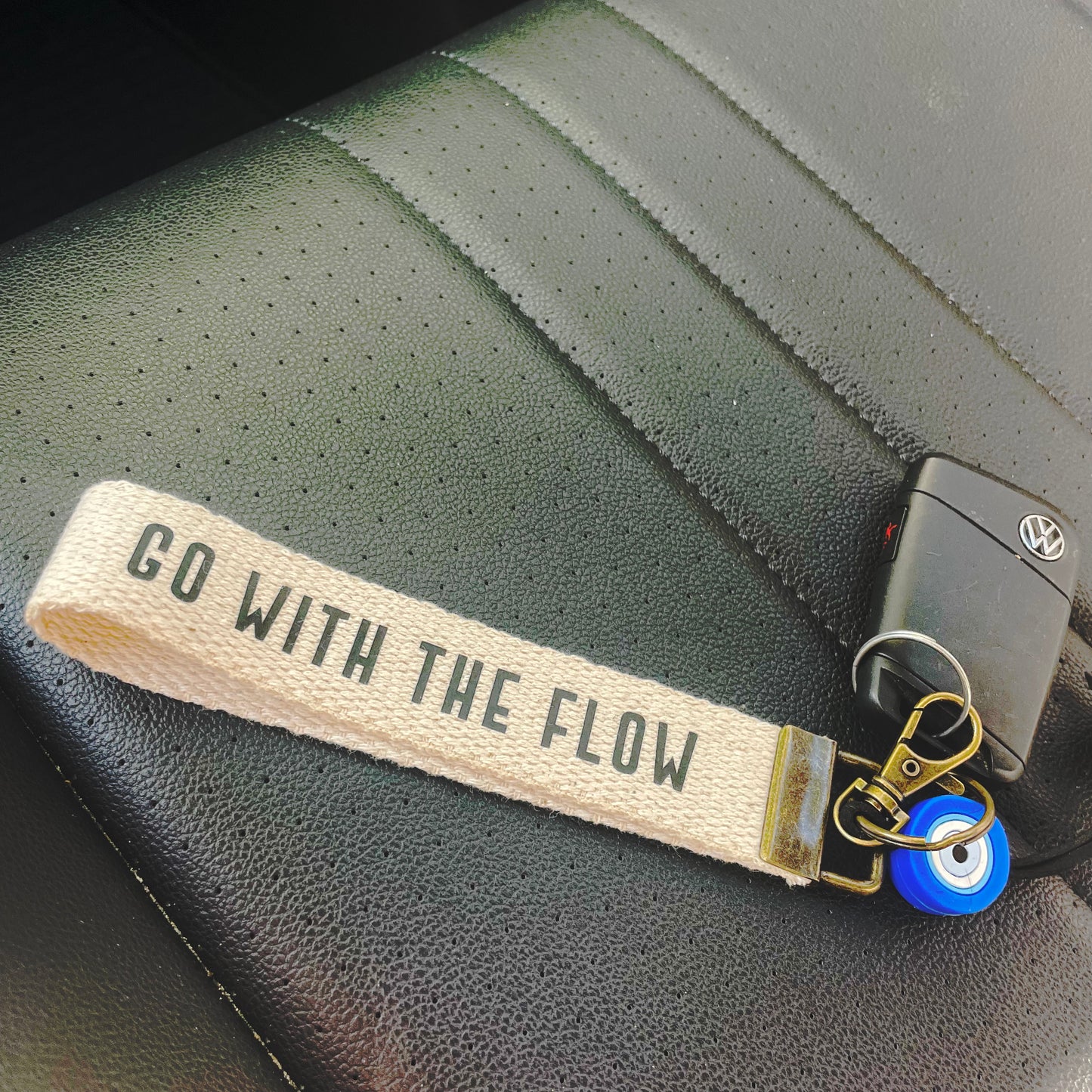 Go with the flow Keychain with Evil Eye