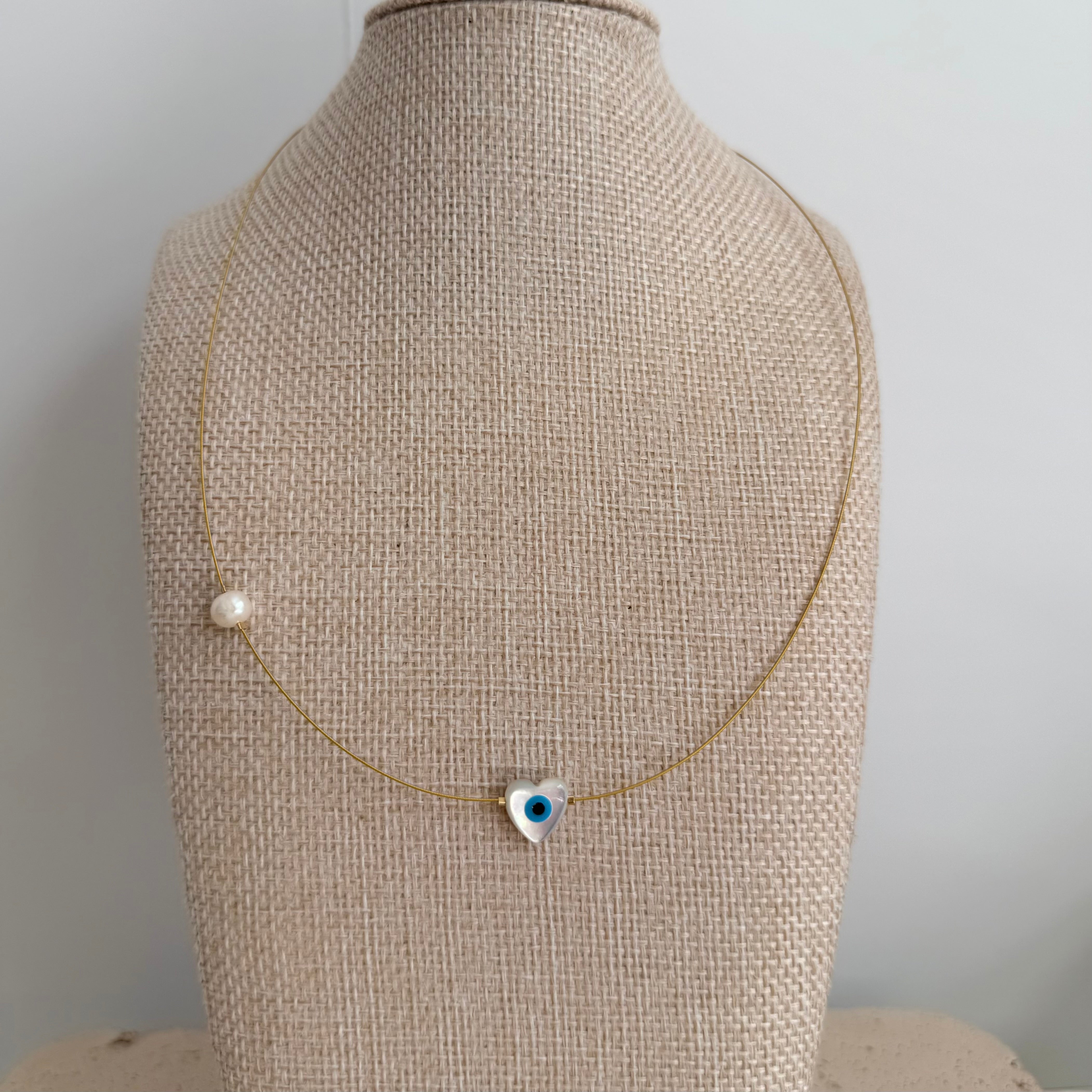 Heart with pearls and lucky eye Necklace