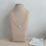 Elephant and Pearl Necklace